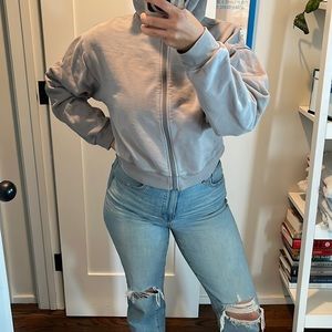 SKIMS cropped zip up hoodie, light gray, size Large.